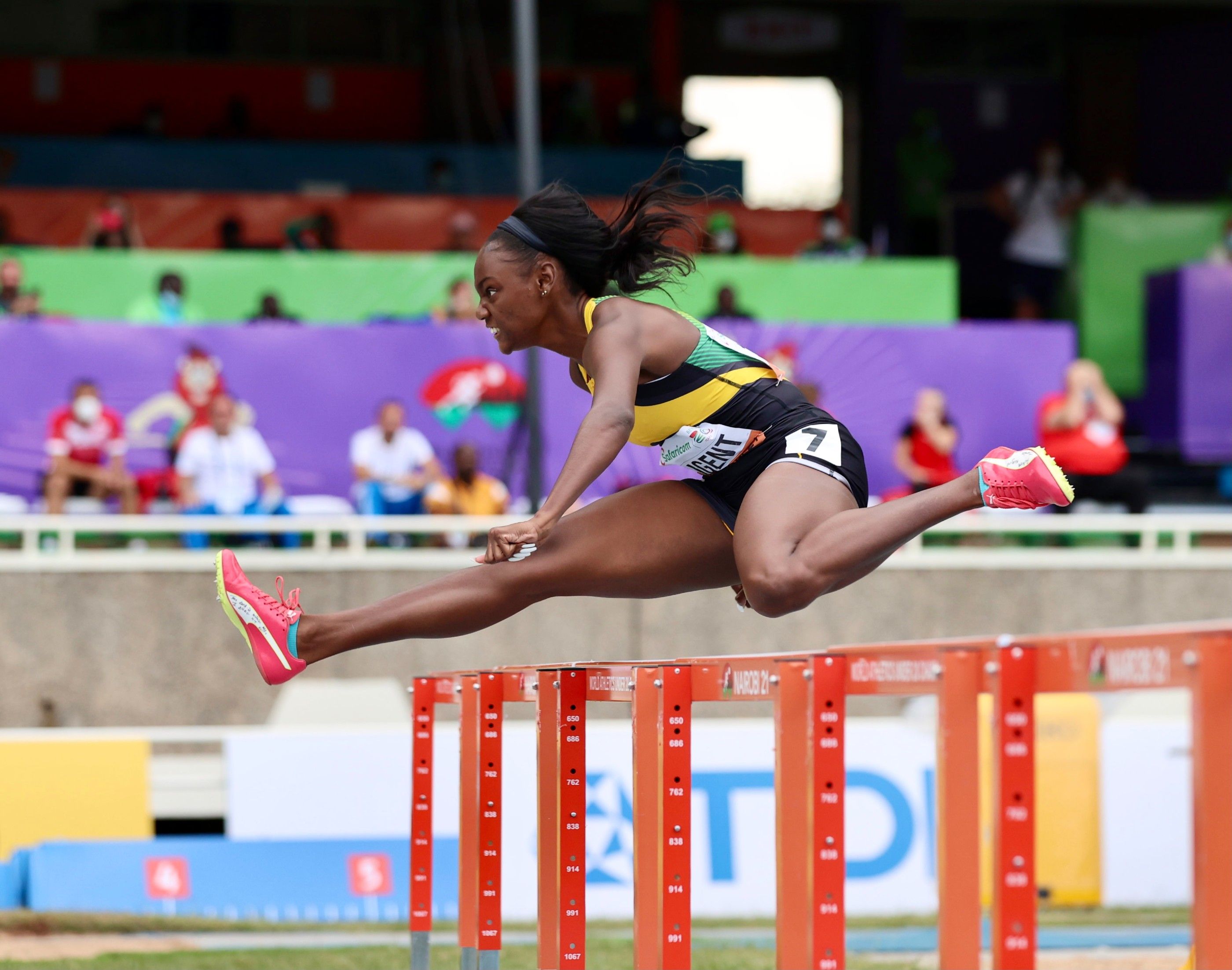 Ackera Nugent on her way to the 100m hurdles title in Nairobi
